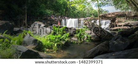 Tat Ton Waterfall is recognized as one of the most beautiful waterfalls in Thailand. Cascade in tropical rainforest with rock, Large cliff and turquoise blue pond at Tat Ton National Park, Chaiyaphum