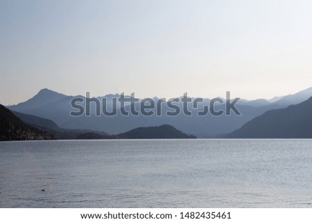 mountains and lake Como minimalist background