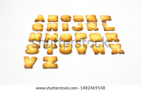shaped crackers alphabet on white background