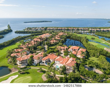 High quality aerials shots of community with an attractive golf camp in Miami Florida. 