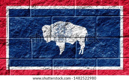 Flag State of Wyoming close up painted on a cracked wall