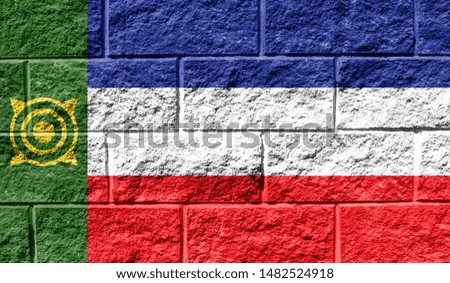 Flag of Khakassia close up painted on a cracked wall