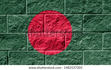 Flag of Bangladesh close up painted on a cracked wall