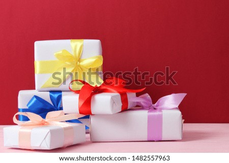 gifts on a colored background. Holiday, giving presents, birthday.
