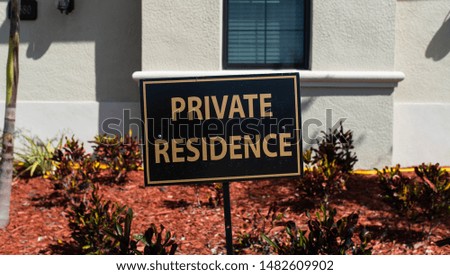Sign stating 'PRIVATE RESIDENCE' on residential property in a golf community neighborhood, South Florida