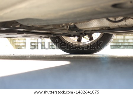 Car wheel undercarriage modern car parts  Royalty-Free Stock Photo #1482641075