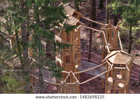 Interesting and unusual, fabulous tree house for children on a playground in a European city