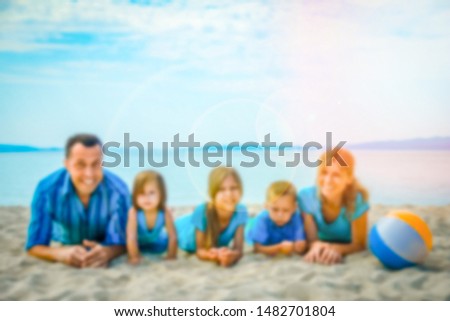 happy family at sea in greece on nature background