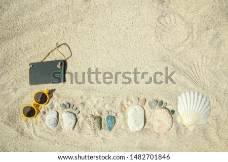 beautiful traces of stones by the sea greece on nature background