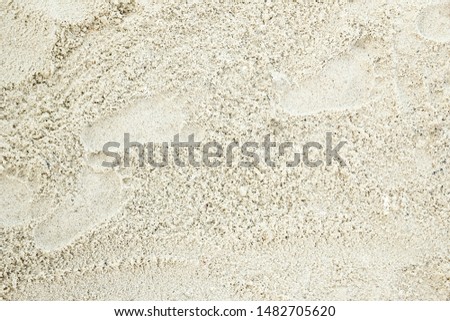 beautiful pattern on the sea sand on nature background