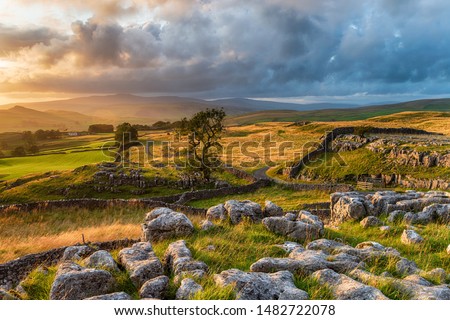 Sunset at the Winskill Stones near Settle in the Yorkshire Dales National Park Royalty-Free Stock Photo #1482722078