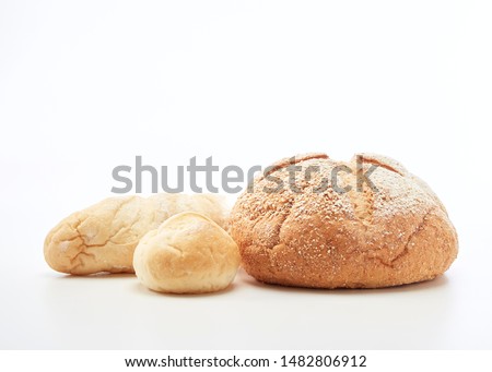 Traditional homemade french bread on a white background