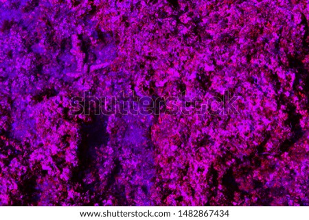 Abstract grunge rock texture glow purple violet pink.