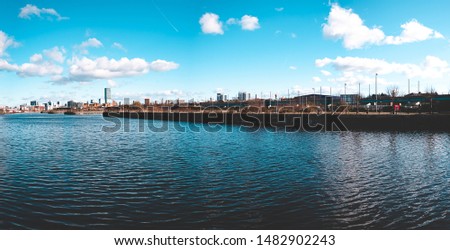 Panoramic views of the Manchester city centre. The city in the distance on the other side of the ship canal.  