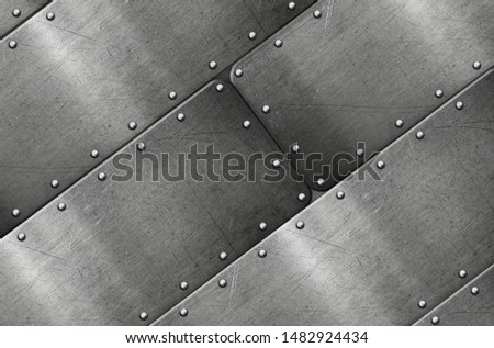 Brushed metal plate with rivets, polished steel texture