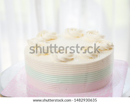 Butter cream cake on table, food concept.