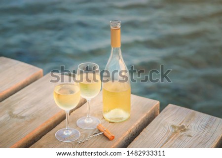 Drink wine by the sea. Selective focus. nature
