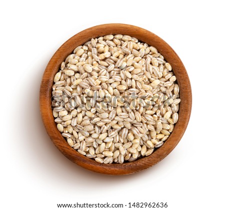 Pearl barley in wooden bowl isolated on white background, top view Royalty-Free Stock Photo #1482962636