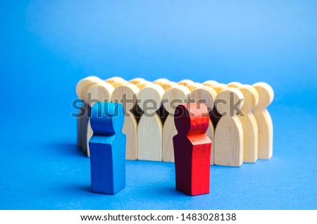 Blue and red people stand in front of a crowd. Conflict of interest concept. Two opponents. Dispute. Search for compromises. Social problems. Business competition. Political Debate Royalty-Free Stock Photo #1483028138