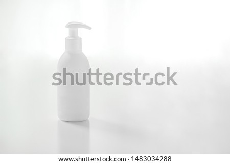 Organic natural cosmetic for baby, plastic bottle of bath cream, shampoo, lotion, shower gel, body milk on white background. Mockup, copy space Royalty-Free Stock Photo #1483034288