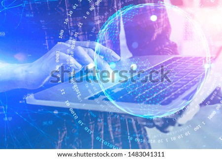 Woman in red shirt using laptop computer with double exposure of planet hologram and internet interface. Concept of internet for education and programming. Toned image