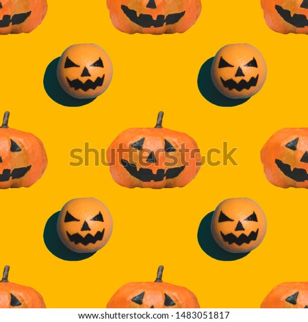 seamless pattern of pumpkins on Halloween on orange background