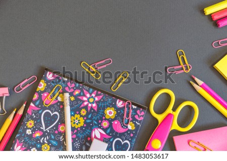 Back to school background with colorful school supplies. Top view with copy space.