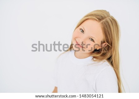 A portrait of a young pretty girl. Beauty, casual fashion.