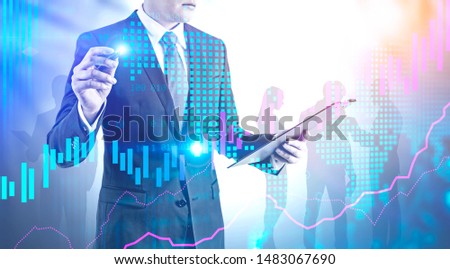 Businessman with clipboard working with digital graph and world map over blurred background with business people. Concept of trading. Toned image