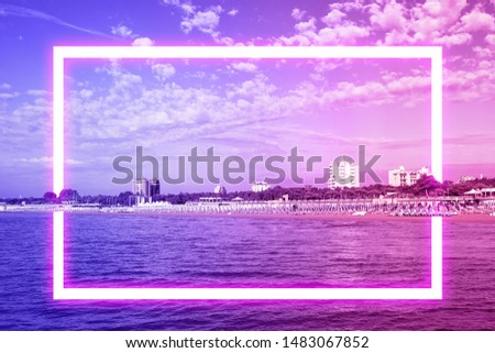 Seascape the horizon in shades of neon with white square frame. Pattern, background. Fantasy filtered shot. Copy space.