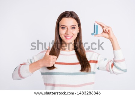 Pretty lady offering to use bronchospasm cartridge aerosol wear striped pullover isolated white background