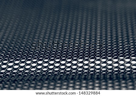 Abstract metal grill background closeup