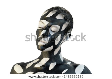 Conceptual creative makeup. Black and gray stains on women skin. Bold body art painting.