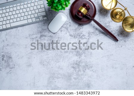 Office lawyer desk with law books,laptop computer, Judge gavel and scales of justice.justice and law concept.