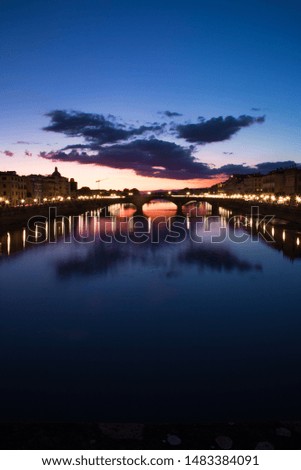 Vertical landscape: Sunset scene from famous Ponte Vecchio, Firenze. Ponte La Carraia. Skyline Florence Landscape