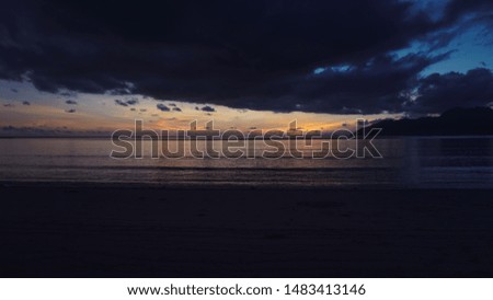 Beautiful outdoor landscape of sea and tropical beach at sunset or sunrise time for leisure travel and vacation.