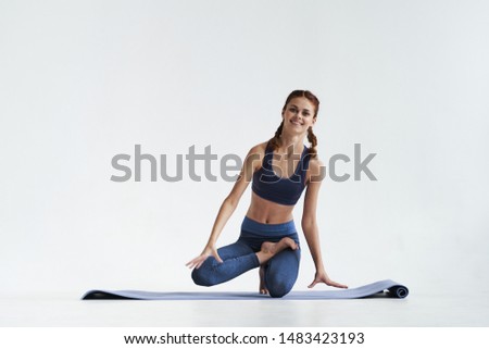 Athletic woman pilates exercises workout meditation