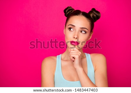 Close up photo of cute concentrated lady looking having thoughts touching her chin with fingers isolated over fuchsia background