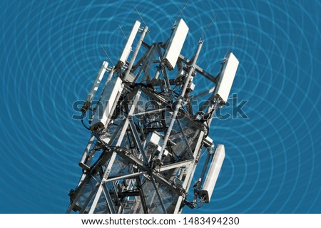 High radio mast with visible electrosmog Royalty-Free Stock Photo #1483494230