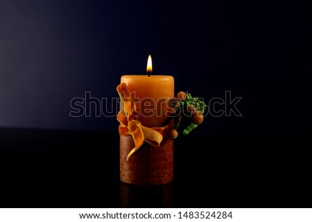 Best Burning Candle Stock Photo on dark background, party calibration concept