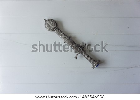 Dagger with holster on white background Royalty-Free Stock Photo #1483546556