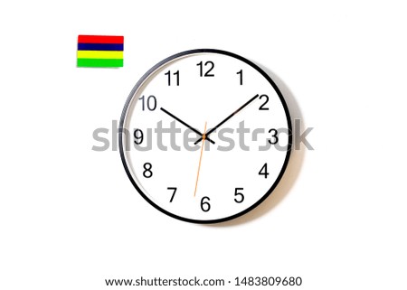 The Flag of Mauritius and White Analog Clock 