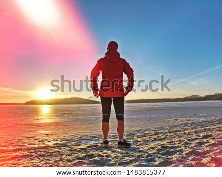 Caucasian person with slim fit body doing exercises and jogging workout in pure nature.  Abstract filter.