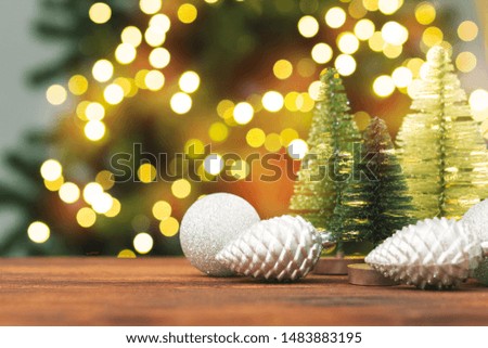 Christmas decor balls on wooden plank, copy space