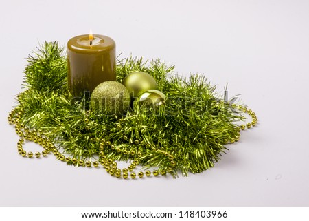 Green christmas decoration on white background.
