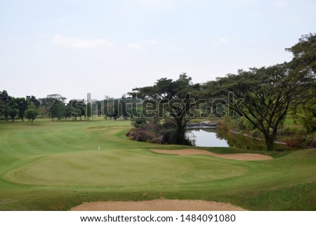 Golf course with a rich green turf beautiful scenery in Pandaan, East Java, Indonesia