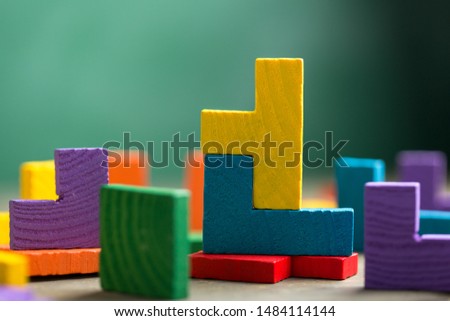 Creative solution for idea - business concept, jigsaw puzzle on the green blackboard background Royalty-Free Stock Photo #1484114144