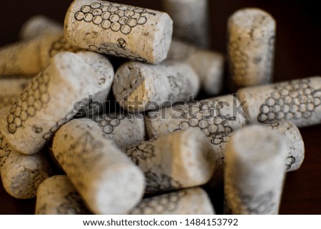 close up of grape print wine corks bokeh background