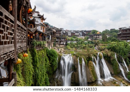 The ancient town of furong on the waterfal Royalty-Free Stock Photo #1484168333