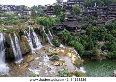 The ancient town of furong on the waterfal Royalty-Free Stock Photo #1484168336